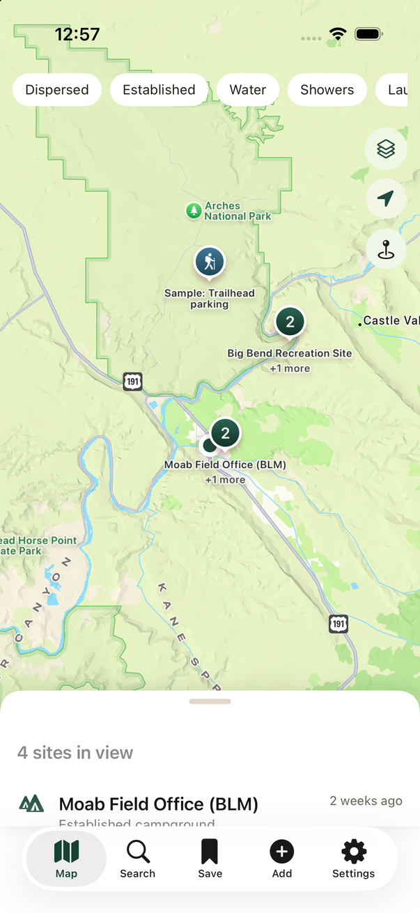The OpenCamp Atlas map showing clustered camping sites near Moab, Utah.