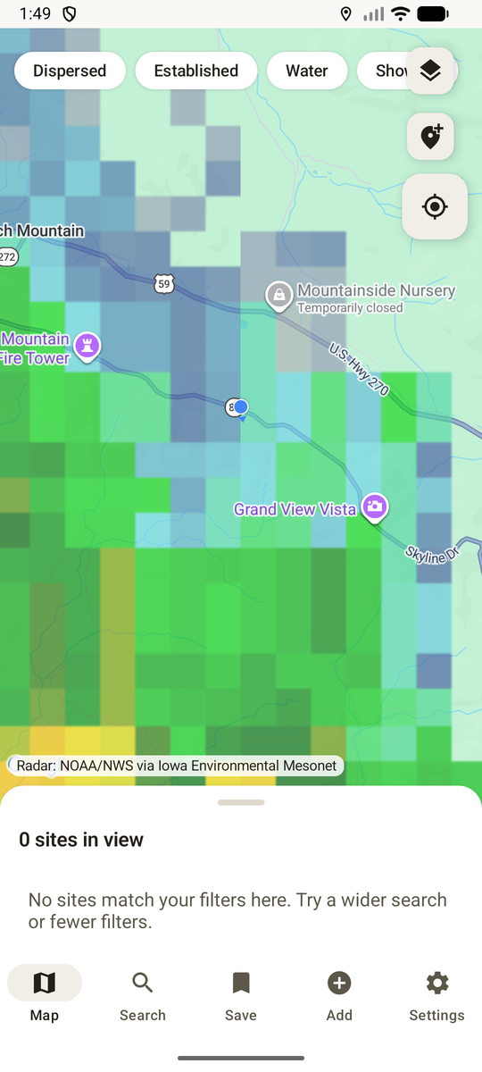 Live NEXRAD weather radar drawn over the map during a storm, with roads and place names still readable underneath.